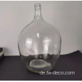 Löschen Sie große runde Glasflaschenvasen